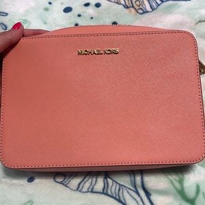 Bright pink Michael Kors crossbody